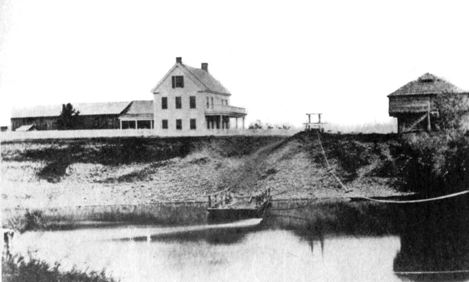 This photo from the City of Centralia shows the blockhouse, home and the ferry (cable visible). The ferry could carry a four-horse team and wagon or two.